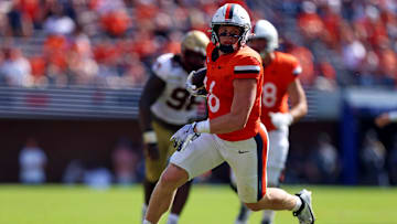 Virginia Cavaliers tight end Tyler Neville runs after a catch during the fourth quarter against the Boston College Eagles.