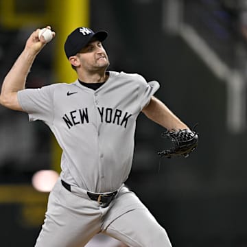 Arlington, Texas, USA; New York Yankees relief pitcher Jake Bird (59) pitches against the Texas Rangers during the tenth inning at Globe Life Field.