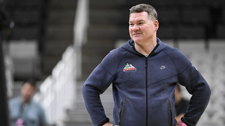 Mar 25, 2026; San Jose, CA, USA; Arizona Wildcats head coach Tommy Lloyd smiles during a practice session ahead of the west regional of the men's 2026 NCAA Tournament at SAP Center. Mandatory Credit: Eakin Howard-Imagn Images