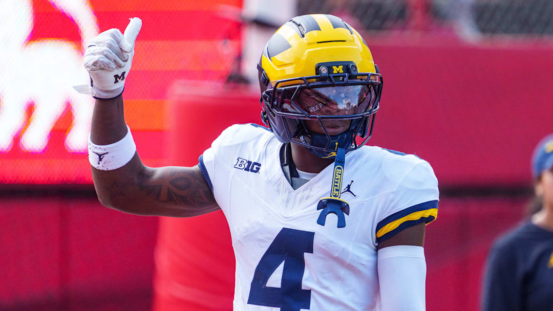 Michigan Wolverines wide receiver Andrew Marsh warms up before the game against the Nebraska Cornhuskers at Memorial Stadium. Michigan Wolverines wide receiver Andrew Marsh warms up before the game against the Nebraska Cornhuskers at Memorial Stadium.
