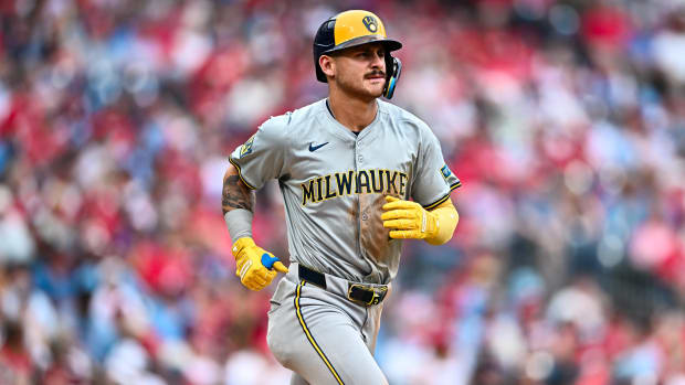 Milwaukee Brewers third baseman Joey Ortiz (3) advances to first on a walk against the Philadelphia Phillies