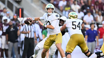 Aug 31, 2024; College Station, Texas, USA; Notre Dame Fighting Irish quarterback Riley Leonard (13) attempts to pass the ball during the first quarter against the Texas A&M Aggies at Kyle Field. Mandatory Credit: Maria Lysaker-Imagn Images