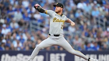 May 31, 2024; Toronto, Ontario, CAN; Pittsburgh Pirates starting pitcher Bailey Falter (26) throws a pitch against the Toronto Blue Jays during the first inning at Rogers Centre. Mandatory Credit: Nick Turchiaro-USA TODAY Sports