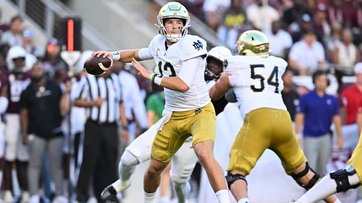 Aug 31, 2024; College Station, Texas, USA; Notre Dame Fighting Irish quarterback Riley Leonard (13) attempts to pass the ball during the first quarter against the Texas A&M Aggies at Kyle Field. 