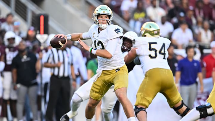 Aug 31, 2024; College Station, Texas, USA; Notre Dame Fighting Irish quarterback Riley Leonard (13) attempts to pass the ball during the first quarter against the Texas A&M Aggies at Kyle Field. Mandatory Credit: Maria Lysaker-Imagn Images