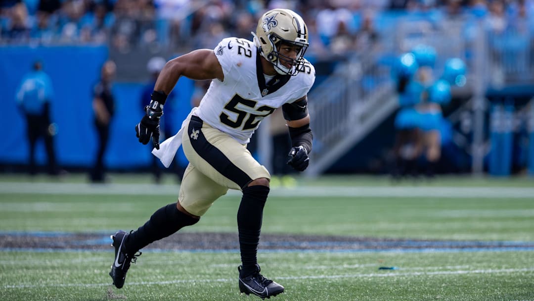 Nov 3, 2024; Charlotte, North Carolina, USA; New Orleans Saints linebacker D'Marco Jackson (52) runs down on a kickoff against the Carolina Panthers during the first quarter at Bank of America Stadium. Mandatory Credit: Scott Kinser-Imagn Images