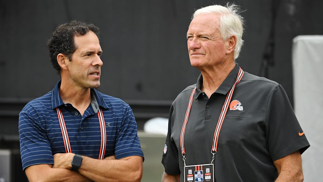 Aug 21, 2022; Cleveland, Ohio, USA; Cleveland Browns chief strategy officer Paul DePodesta, left, talks with managing and principal partner Jimmy Haslam before the game between the Cleveland Browns and the Philadelphia Eagles at FirstEnergy Stadium. Mandatory Credit: Ken Blaze-Imagn Images