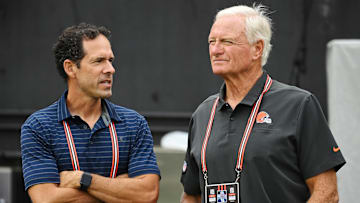 Aug 21, 2022; Cleveland, Ohio, USA; Cleveland Browns chief strategy officer Paul DePodesta, left, talks with managing and principal partner Jimmy Haslam before the game between the Cleveland Browns and the Philadelphia Eagles at FirstEnergy Stadium. Mandatory Credit: Ken Blaze-Imagn Images