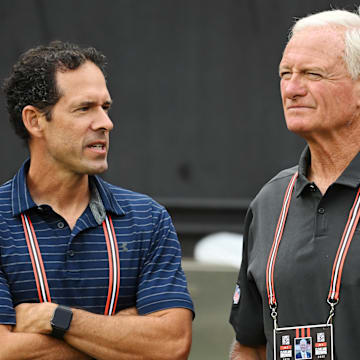 Aug 21, 2022; Cleveland, Ohio, USA; Cleveland Browns chief strategy officer Paul DePodesta, left, talks with managing and principal partner Jimmy Haslam before the game between the Cleveland Browns and the Philadelphia Eagles at FirstEnergy Stadium. Mandatory Credit: Ken Blaze-Imagn Images