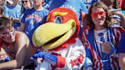 Sep 24, 2022; Lawrence, Kansas, USA; The Kansas Jayhawks mascot sits with fans against the Duke Blue Devils during the second half of the game at David Booth Kansas Memorial Stadium. 