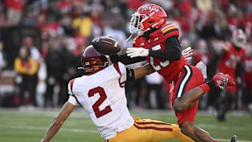 Oct 19, 2024; College Park, Maryland, USA;Maryland Terrapins defensive back Kevis Thomas (25) breaks up a pass intended for Southern California Trojans wide receiver Duce Robinson (2) during the first half   at SECU Stadium. Mandatory Credit: Tommy Gilligan-Imagn Images