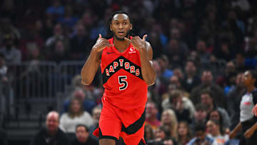 Immanuel Quickley celebrates another three-pointer as the Toronto Raptors take on the Cleveland Cavaliers