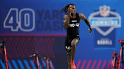 Texas wide receiver Xavier Worthy (WO40) ran an official time of 4.21 seconds to set a record during the 2024 NFL Combine.