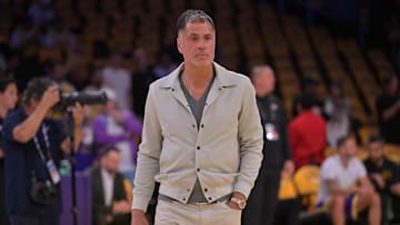 Apr 19, 2025; Los Angeles, California, USA;  Los Angeles Lakers general manager Rob Pelinka walks on the couet prior to the game against the Minnesota Timberwolves at Crypto.com Arena. Mandatory Credit: Jayne Kamin-Oncea-Imagn Images