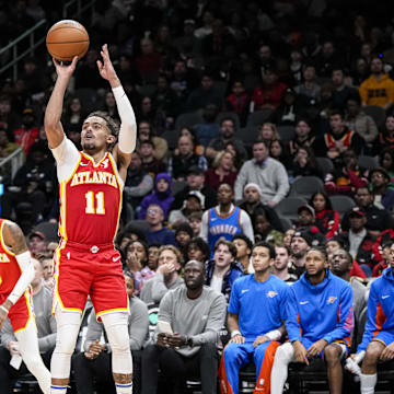 Jan 3, 2024; Atlanta, Georgia, USA; Atlanta Hawks guard Trae Young (11) shoots against the Oklahoma City Thunder during the second half at State Farm Arena. Mandatory Credit: Dale Zanine-Imagn Images