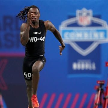 Texas wide receiver Xavier Worthy (WO40) ran an official time of 4.21 seconds to set a record during the 2024 NFL Combine.