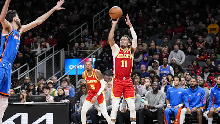 Jan 3, 2024; Atlanta, Georgia, USA; Atlanta Hawks guard Trae Young (11) shoots against the Oklahoma City Thunder during the second half at State Farm Arena. Mandatory Credit: Dale Zanine-Imagn Images