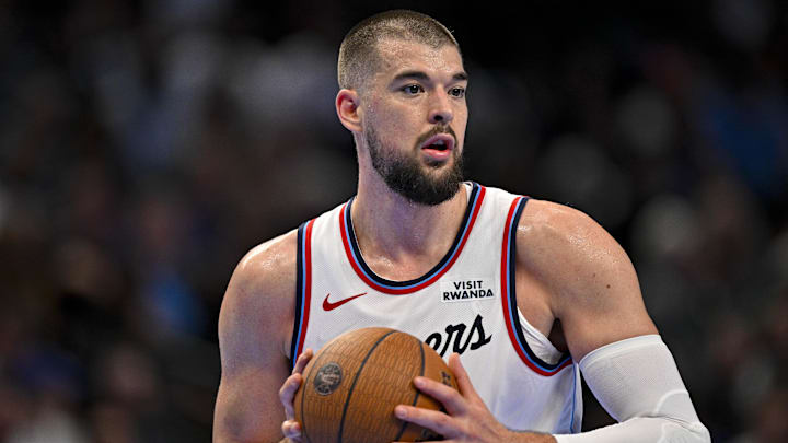 Former Los Angeles Clippers center Ivica Zubac (40) looks to pass the ball during the second quarter against the Dallas Mavericks in an NBA Cup game at the American Airlines Center.