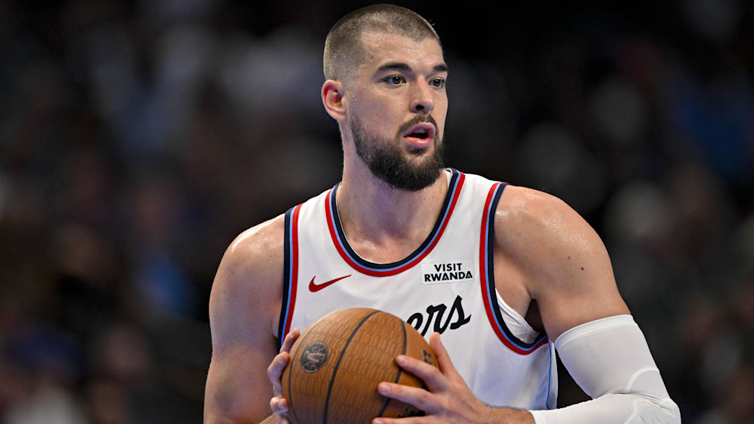 Nov 14, 2025; Dallas, Texas, USA; LA Clippers center Ivica Zubac (40) looks to pass the ball during the second quarter against the Dallas Mavericks in an NBA Cup game at the American Airlines Center. Mandatory Credit: Jerome Miron-Imagn Images