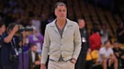 Los Angeles Lakers general manager Rob Pelinka walks on the court before the game against the Minnesota Timberwolves.