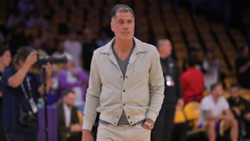 Los Angeles Lakers general manager Rob Pelinka walks on the court before the game against the Minnesota Timberwolves.