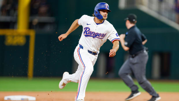 Josh Smith stole home in the first and drove in a run with a double in the eighth Tuesday night.