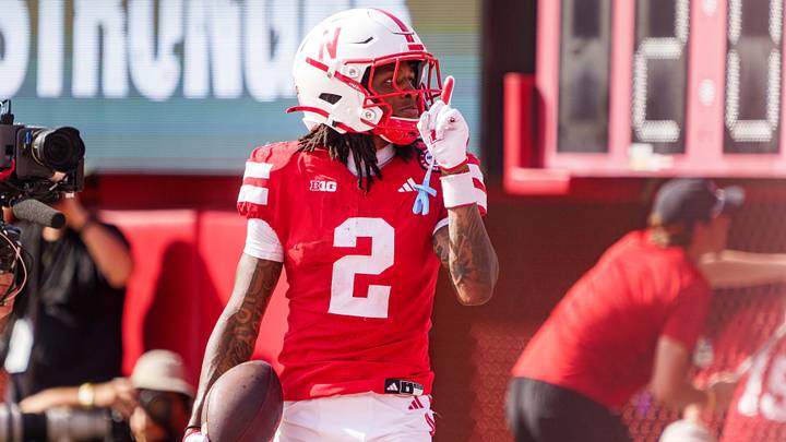 Sep 20, 2025; Lincoln, Nebraska, USA; Nebraska Cornhuskers wide receiver Jacory Barney Jr. (2) reacts after scoring a touchdown against the Michigan Wolverines during the second quarter at Memorial Stadium. Mandatory Credit: Dylan Widger-Imagn Images