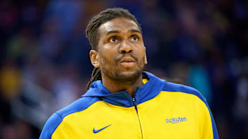 Apr 13, 2025; San Francisco, California, USA; Golden State Warriors forward Kevon Looney (5) warms up before the game between the Golden State Warriors and the LA Clippers at Chase Center. Mandatory Credit: Robert Edwards-Imagn Images