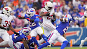 Sep 8, 2024; Orchard Park, New York, USA; Arizona Cardinals running back DeeJay Dallas (20) returns a kick off for a touchdown against the Buffalo Bills during the second half at Highmark Stadium. Mandatory Credit: Gregory Fisher-Imagn Images