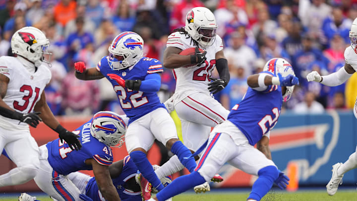 Sep 8, 2024; Orchard Park, New York, USA; Arizona Cardinals running back DeeJay Dallas (20) returns a kick off for a touchdown against the Buffalo Bills during the second half at Highmark Stadium. Mandatory Credit: Gregory Fisher-Imagn Images