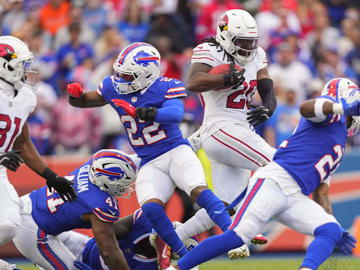 Sep 8, 2024; Orchard Park, New York, USA; Arizona Cardinals running back DeeJay Dallas (20) returns a kick off for a touchdown against the Buffalo Bills during the second half at Highmark Stadium. Mandatory Credit: Gregory Fisher-Imagn Images