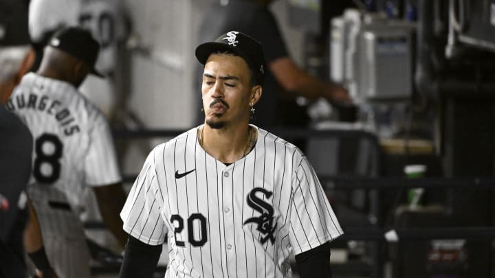 Aug 31, 2024; Chicago, Illinois, USA;  Chicago White Sox outfielder Miguel Vargas (20) is seen in the dugout after the team’s loss to the New York Mets at Guaranteed Rate Field. The team tied their franchise record for most losses in a season.