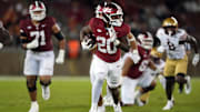 Sep 13, 2025; Stanford, California, USA; Stanford Cardinal running back Micah Ford (20) carries the ball against the Boston College Eagles during the fourth quarter at Stanford Stadium. Mandatory Credit: Darren Yamashita-Imagn Images