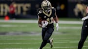 Dec 1, 2024; New Orleans, Louisiana, USA; New Orleans Saints running back Alvin Kamara (41) runs against the Los Angeles Rams during the first half at Caesars Superdome. Mandatory Credit: Matthew Hinton-Imagn Images