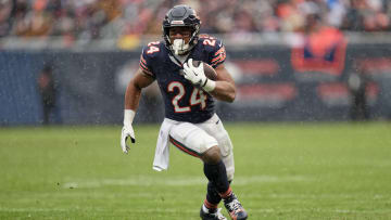 Dec 31, 2023; Chicago, Illinois, USA;  Chicago Bears running back Khalil Herbert (24) runs with the ball against the Atlanta Falcons at Soldier Field. Mandatory Credit: Jamie Sabau-USA TODAY Sports