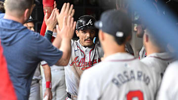 Atlanta Braves shortstop Nacho Alvarez Jr. (17) is congratulated after scoring a run against the Milwaukee Brewers in the third inning at American Family Field.