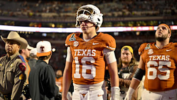 Dec 21, 2024; Austin, Texas, USA; Texas Longhorns quarterback Arch Manning (16) walks off the field after UT defeats the Clemson Tigers in the CFP National Playoff first round game at Darrell K Royal-Texas Memorial Stadium. Mandatory Credit: Jerome Miron-Imagn Images