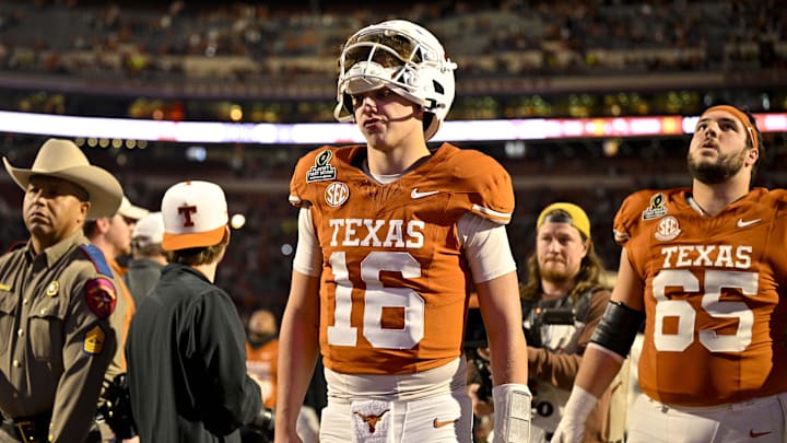 Dec 21, 2024; Austin, Texas, USA; Texas Longhorns quarterback Arch Manning (16) walks off the field after UT defeats the Clemson Tigers in the CFP National Playoff first round game at Darrell K Royal-Texas Memorial Stadium. Mandatory Credit: Jerome Miron-Imagn Images