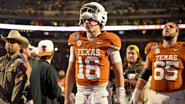 Dec 21, 2024; Austin, Texas, USA; Texas Longhorns quarterback Arch Manning (16) walks off the field after UT defeats the Clemson Tigers in the CFP National Playoff first round game at Darrell K Royal-Texas Memorial Stadium. Mandatory Credit: Jerome Miron-Imagn Images