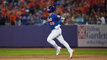 Feb 25, 2023; Port St. Lucie, Florida, USA; New York Mets first baseman Pete Alonso (20) rounds the bases after hitting a home run in the second inning against the Miami Marlins at Clover Park. Mandatory Credit: Jim Rassol-Imagn Images
