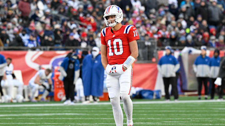 Dec 1, 2024; Foxborough, Massachusetts, USA; New England Patriots quarterback Drake Maye (10) waits for game action to resume during the second half against the Indianapolis Colts at Gillette Stadium.