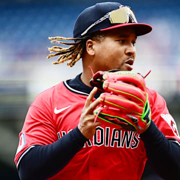 Apr 26, 2025; Cleveland, Ohio, USA; Cleveland Guardians third baseman Jose Ramirez (11) makes a play on a ball hit by Boston Red Sox shortstop Trevor Story (not pictured) during the first inning at Progressive Field. Mandatory Credit: Ken Blaze-Imagn Images