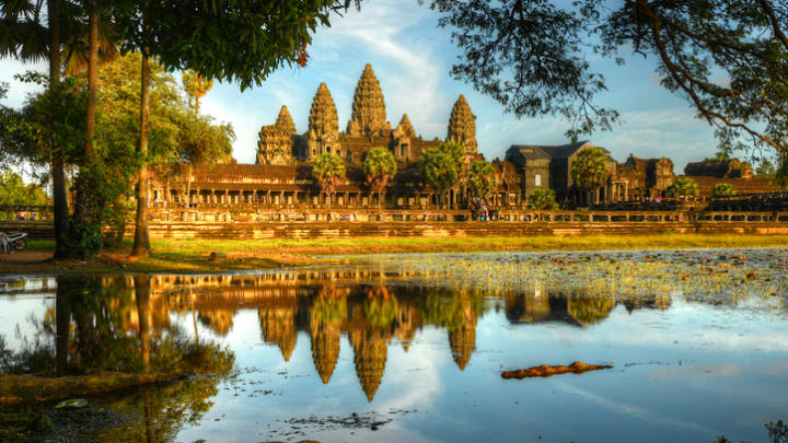 Angkor Wat reflected in one of its waterways.