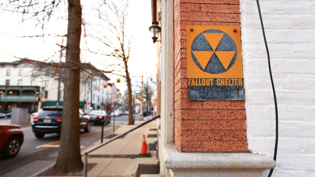 A fallout shelter sign left over from the Cold War still visible in Brooklyn, New York. A fallout shelter sign left over from the Cold War still visible in Brooklyn, New York.