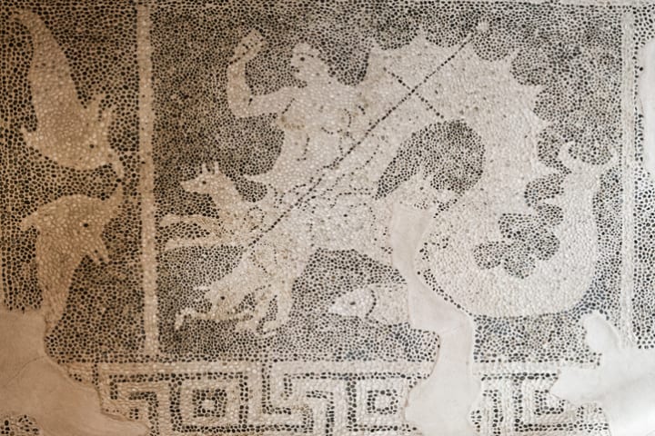 A floor mosaic depicting Scylla