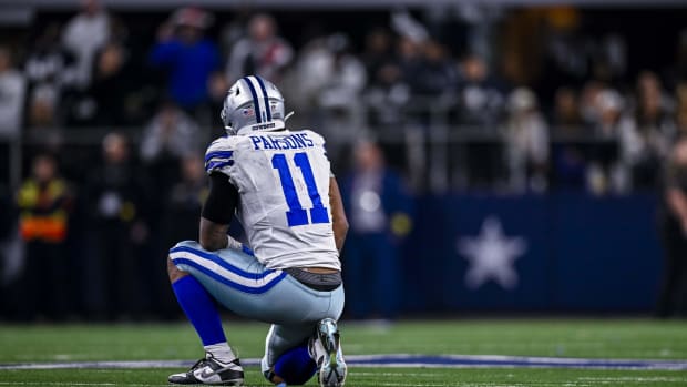 Dallas Cowboys linebacker Micah Parsons (11) kneels on the field during the second half of the game against the Philadelphi