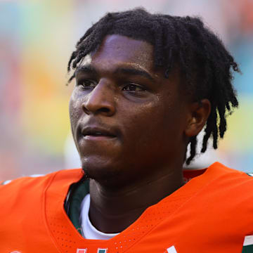 Sep 7, 2024; Miami Gardens, Florida, USA; Miami Hurricanes quarterback Cam Ward (1) looks on before the game against the Florida A&M Rattlers at Hard Rock Stadium. Mandatory Credit: Sam Navarro-Imagn Images