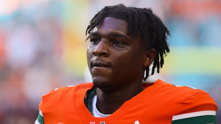 Sep 7, 2024; Miami Gardens, Florida, USA; Miami Hurricanes quarterback Cam Ward (1) looks on before the game against the Florida A&M Rattlers at Hard Rock Stadium. Mandatory Credit: Sam Navarro-Imagn Images