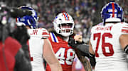 Elliss's hit on Dart sparked an altercation between Patriots linebacker Jahlani Tavai (#48) and Giants guard Jon Runyan (#76) during Monday's game. 