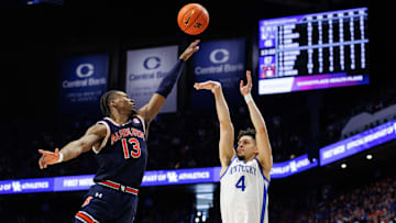 Mar 1, 2025; Lexington, Kentucky, USA; Kentucky Wildcats guard Koby Brea (4) shoots the ball over Auburn Tigers guard Miles Kelly (13) during the second half at Rupp Arena at Central Bank Center. Mandatory Credit: Jordan Prather-Imagn Images